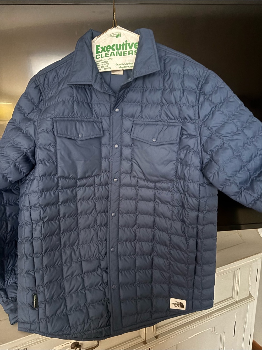 The North Face Men’s Navy Quilted Snap-Front Puffer Jacket